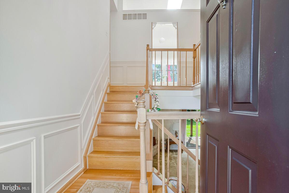 674 Teton Drive Lothian, MD 20711 - Photo 3 of 38 a view of entryway with wooden floor