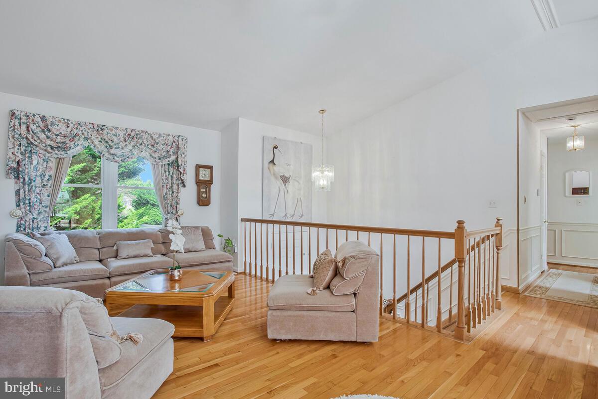 674 Teton Drive Lothian, MD 20711 - Photo 6 of 38 a living room with furniture and a large window