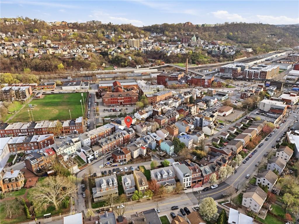 3468 Ligonier Street Pittsburgh, PA 15201 - Photo 31 of 33 an aerial view of a city with mountains