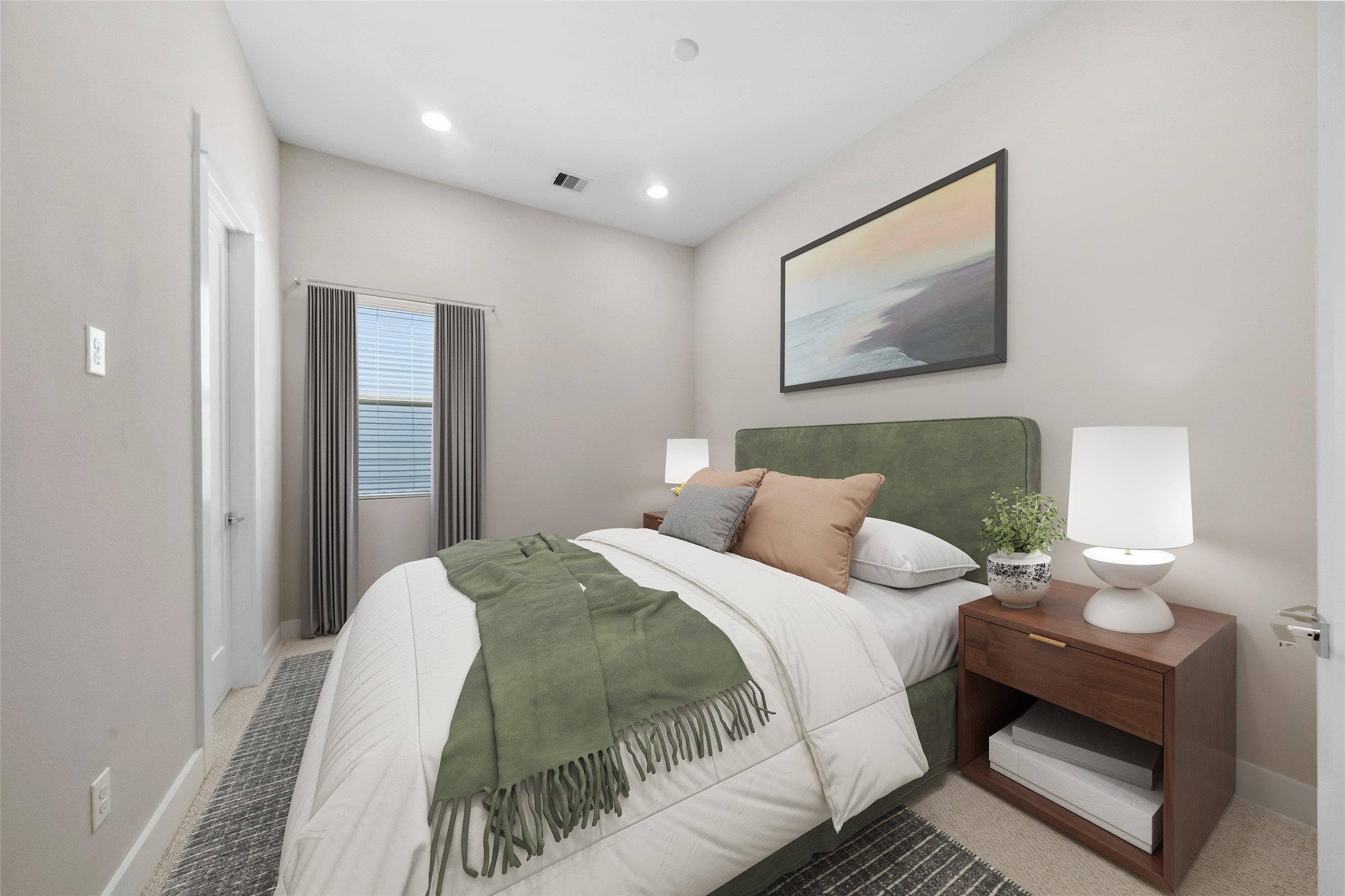 1707 Freeman Street Houston, TX 77009 - Photo 14 of 20 a bedroom with a bed and a painting on the wall