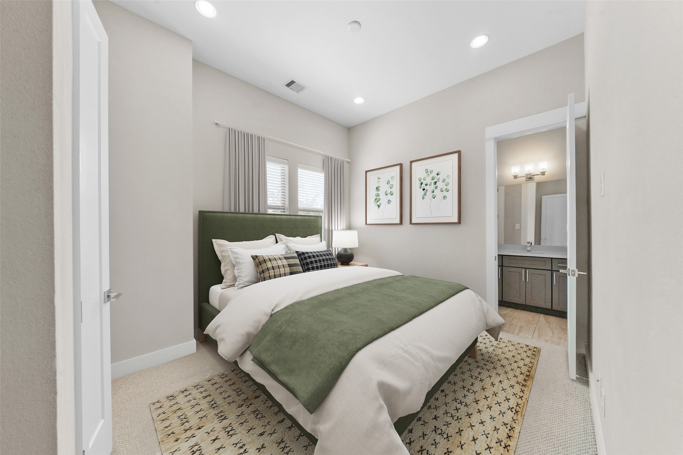 1707 Freeman Street Houston, TX 77009 - Photo 16 of 20 a bedroom with a large bed and a chandelier