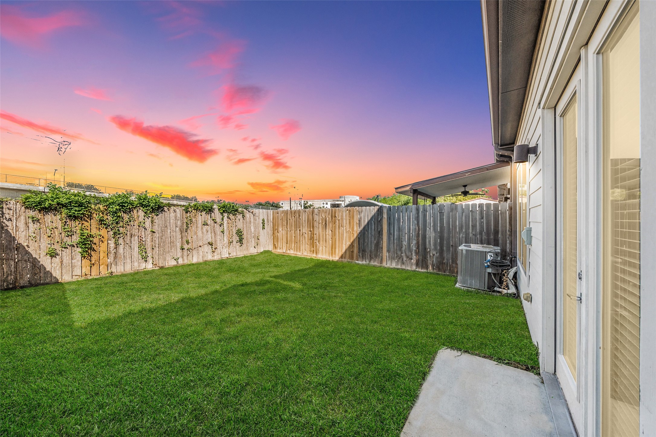 1707 Freeman Street Houston, TX 77009 - Photo 17 of 20 a view of a yard with wooden fence
