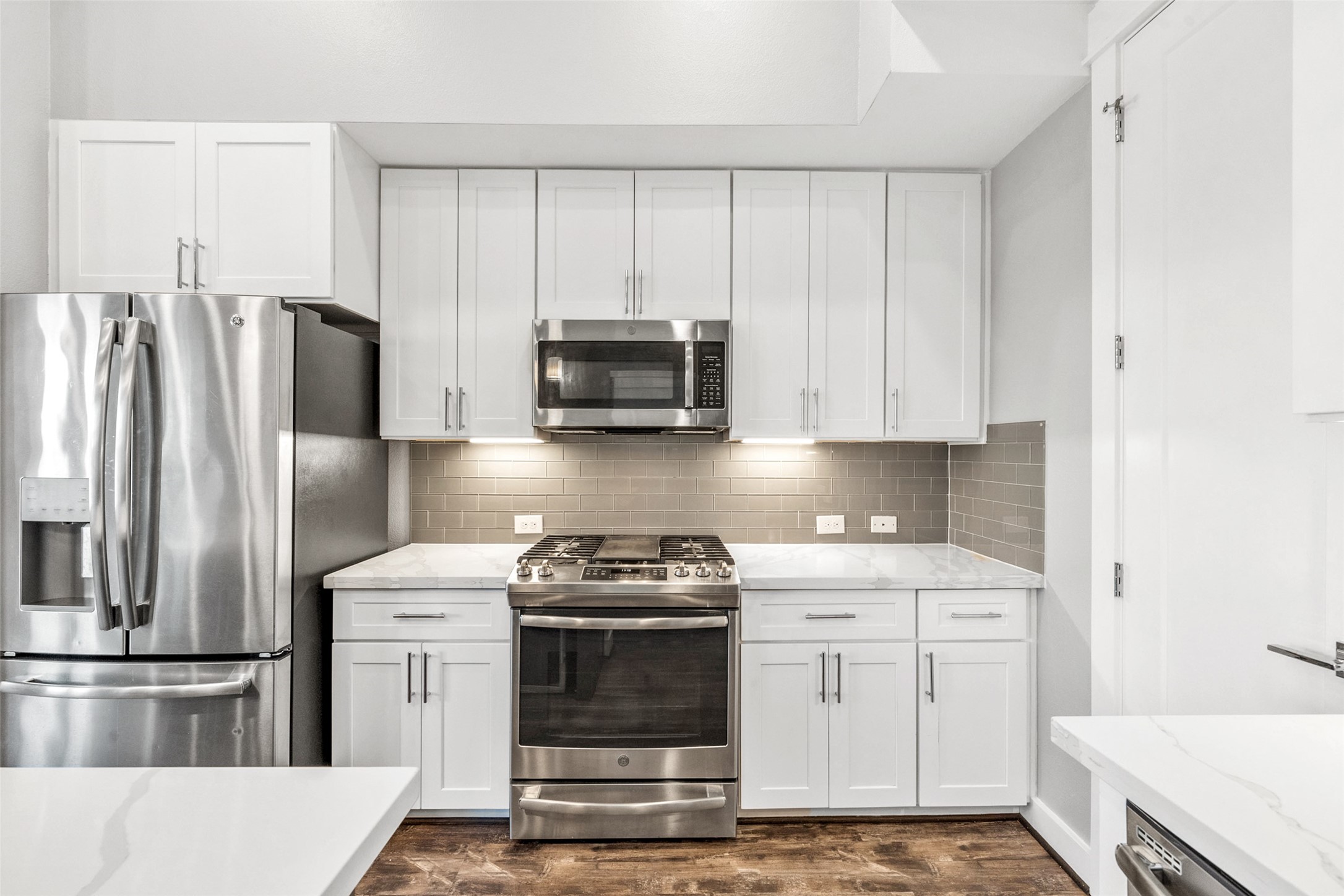 1707 Freeman Street Houston, TX 77009 - Photo 3 of 20 a kitchen with appliances a sink and cabinets