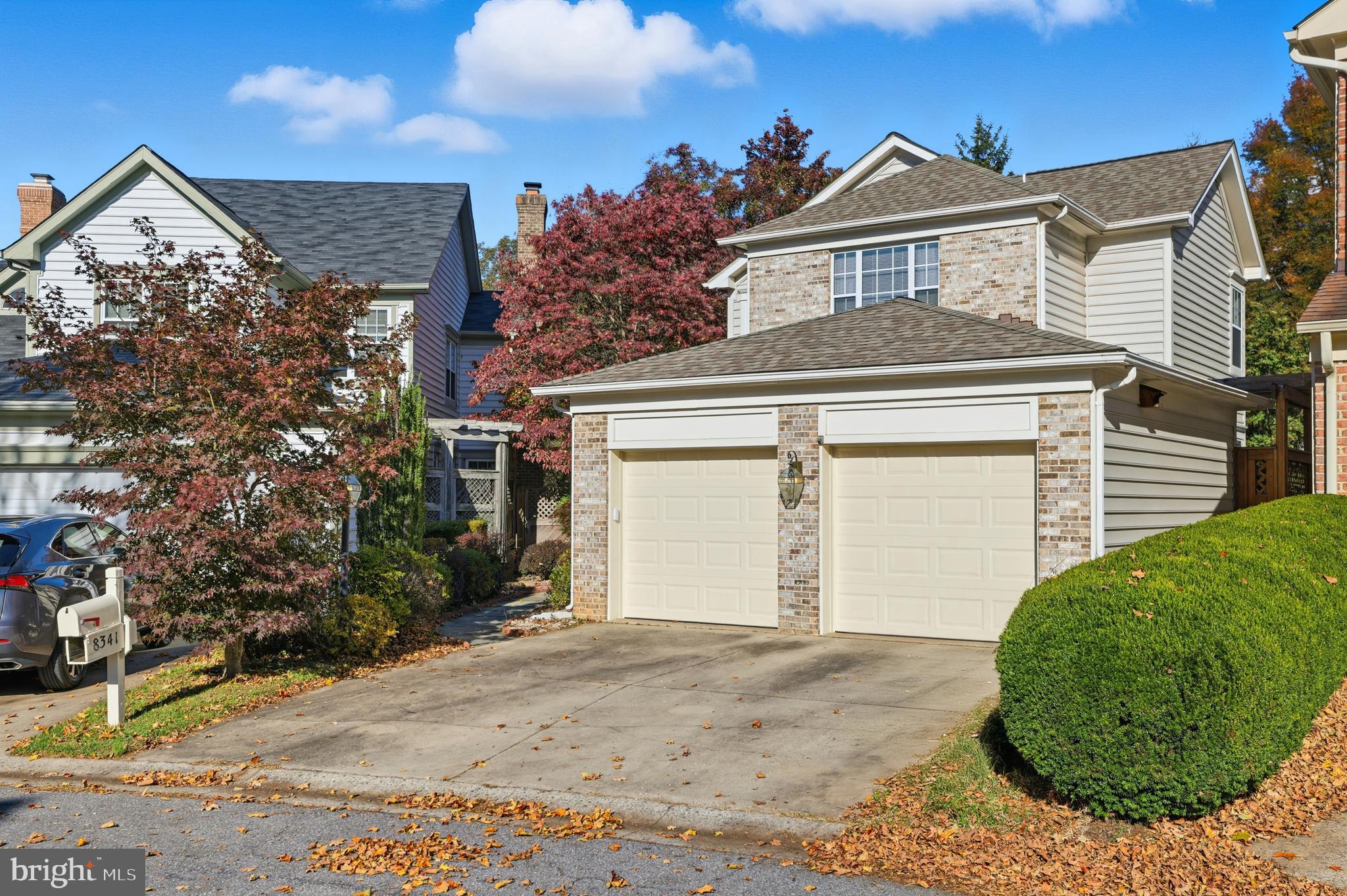 8341 Marketree Circle Montgomery Village, MD 20886 - Photo 2 of 43 front view of a house with a yard