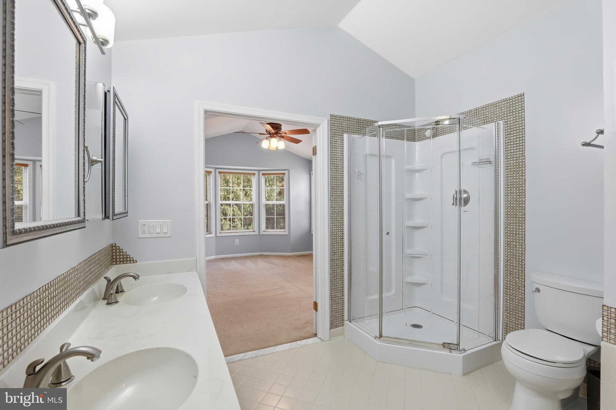 8341 Marketree Circle Montgomery Village, MD 20886 - Photo 23 of 43 a bathroom with a sink toilet and shower