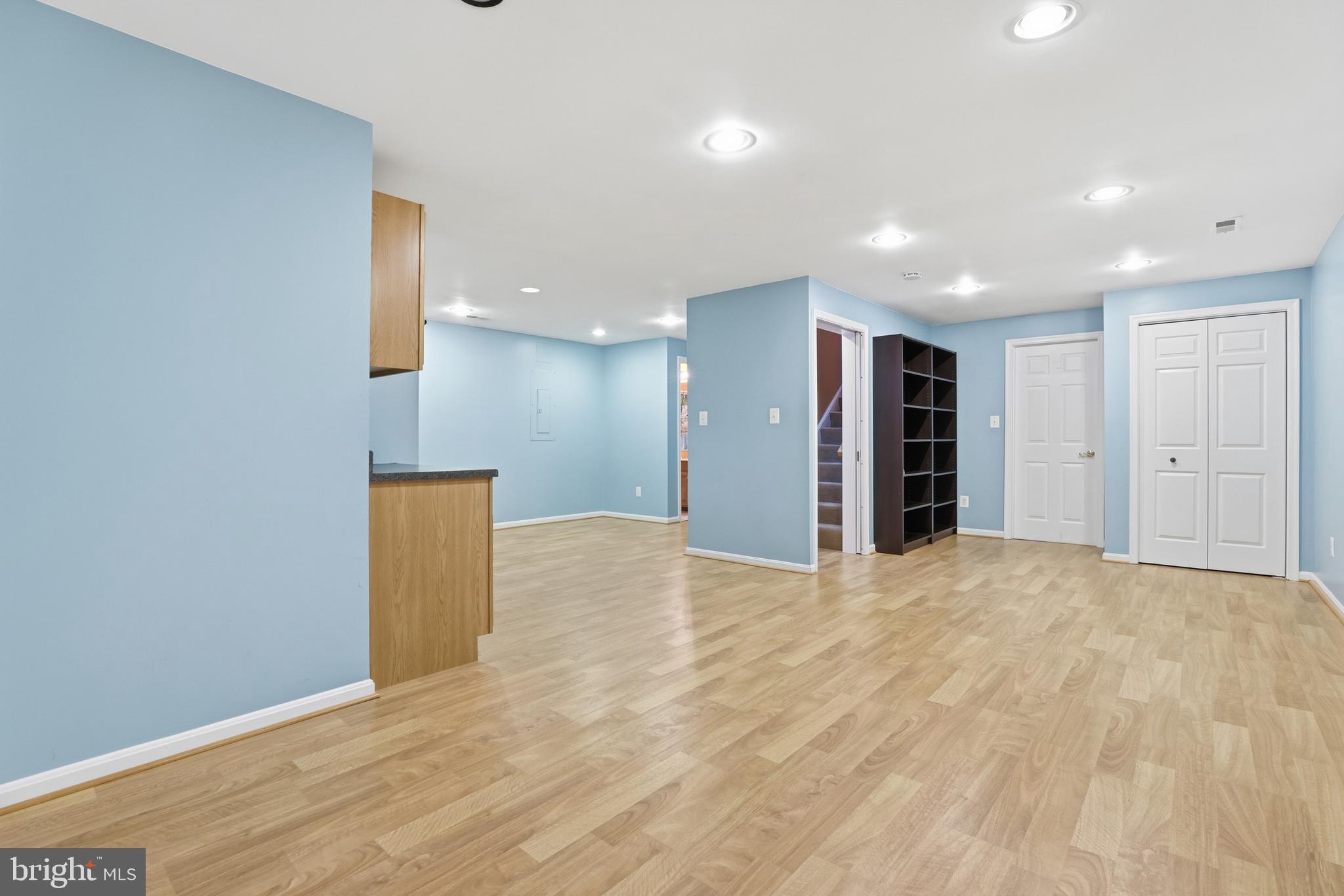 8341 Marketree Circle Montgomery Village, MD 20886 - Photo 33 of 43 a view of an empty room with a kitchen