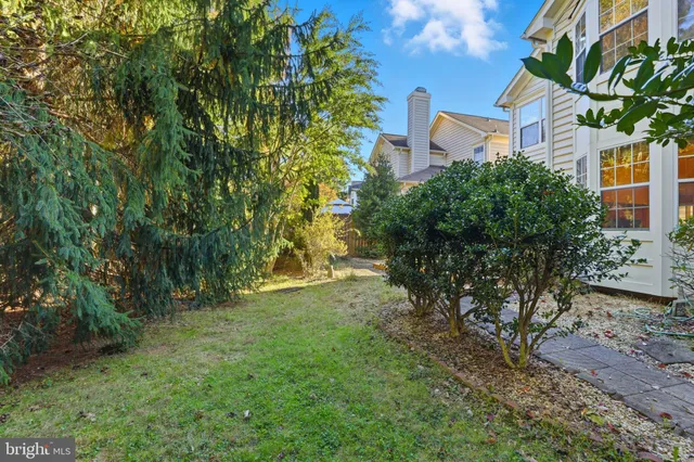 a view of backyard with green space