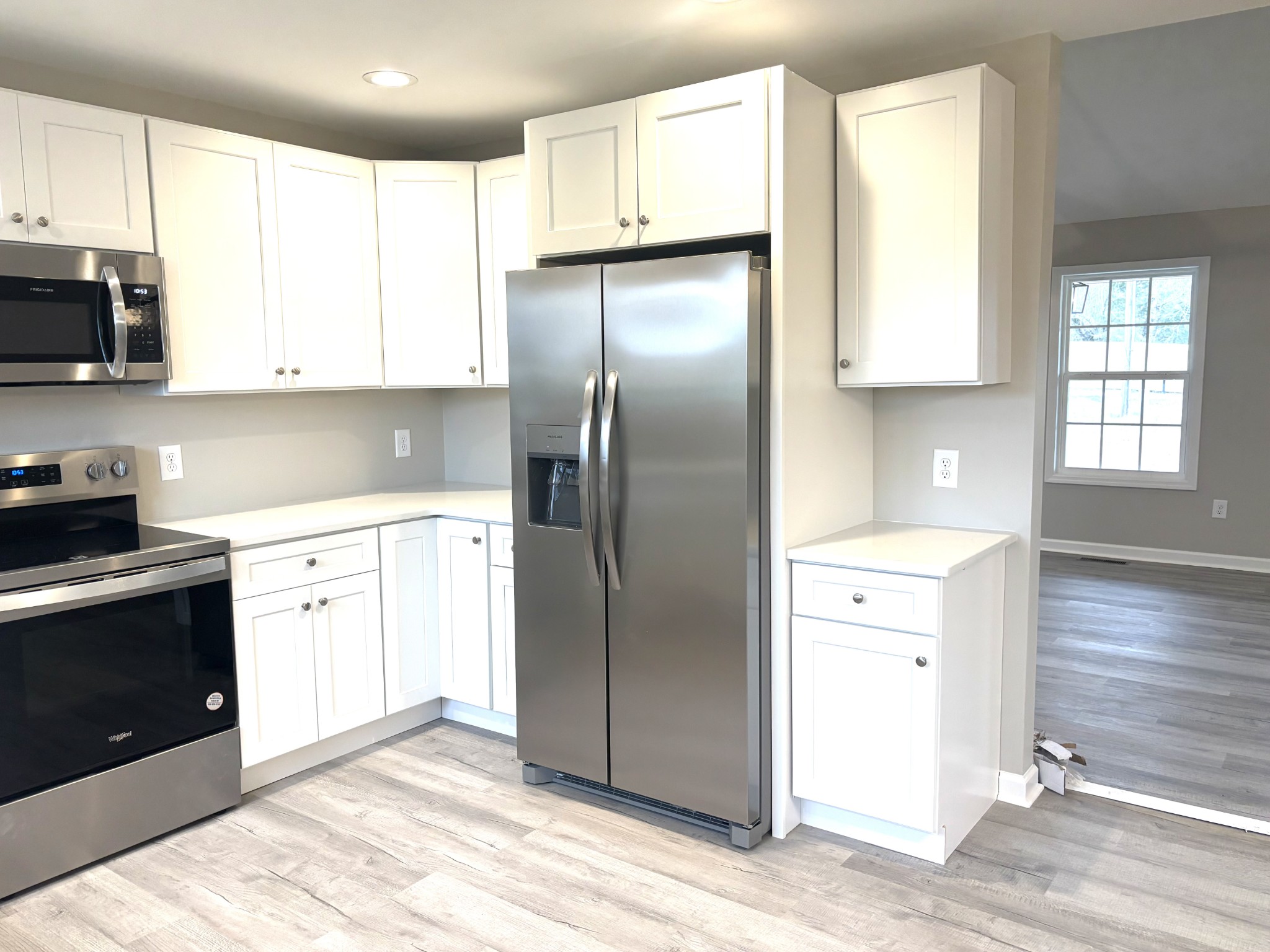 2079 Old Well Road Morrison, TN 37357 - Photo 4 of 23 a kitchen with stainless steel appliances granite countertop a refrigerator and a stove top oven
