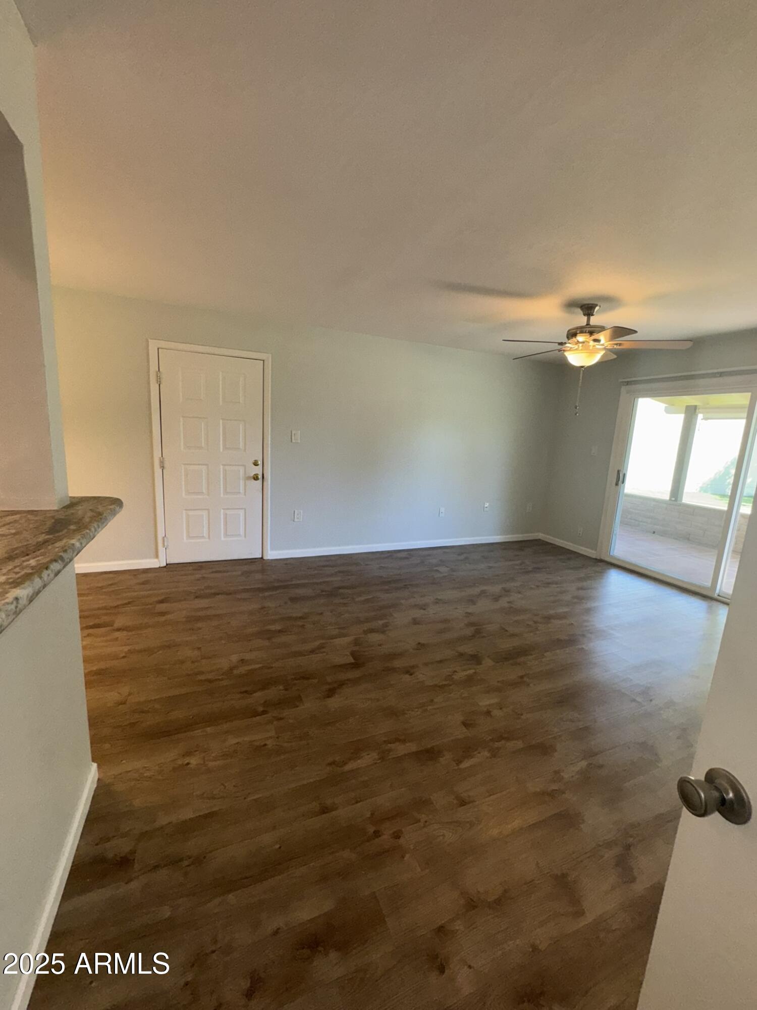 131 North Higley Road, Unit 71 Mesa, AZ 85205 - Photo 5 of 15 a view of an empty room and window