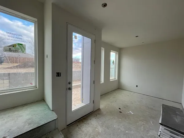 an empty room with a door