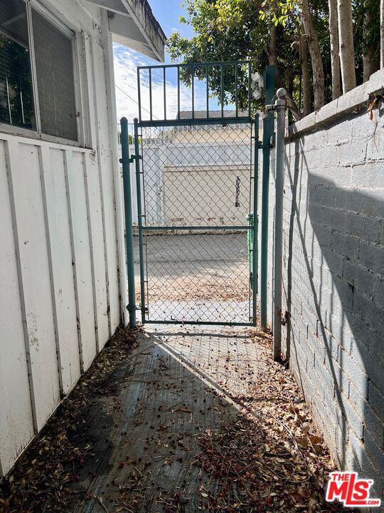Carmelita Avenue Beverly Hills, CA 90210 - Photo 12 of 14 a view of a entrance gate of the house