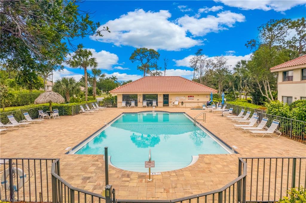 191 Bennington Drive, Unit 124 Naples, FL 34104 - Photo 26 of 26 a view of swimming pool with a patio