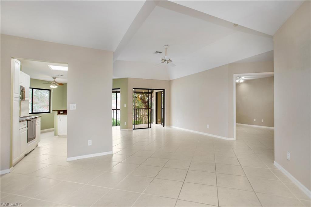 191 Bennington Drive, Unit 124 Naples, FL 34104 - Photo 5 of 26 a view of an empty room with a window