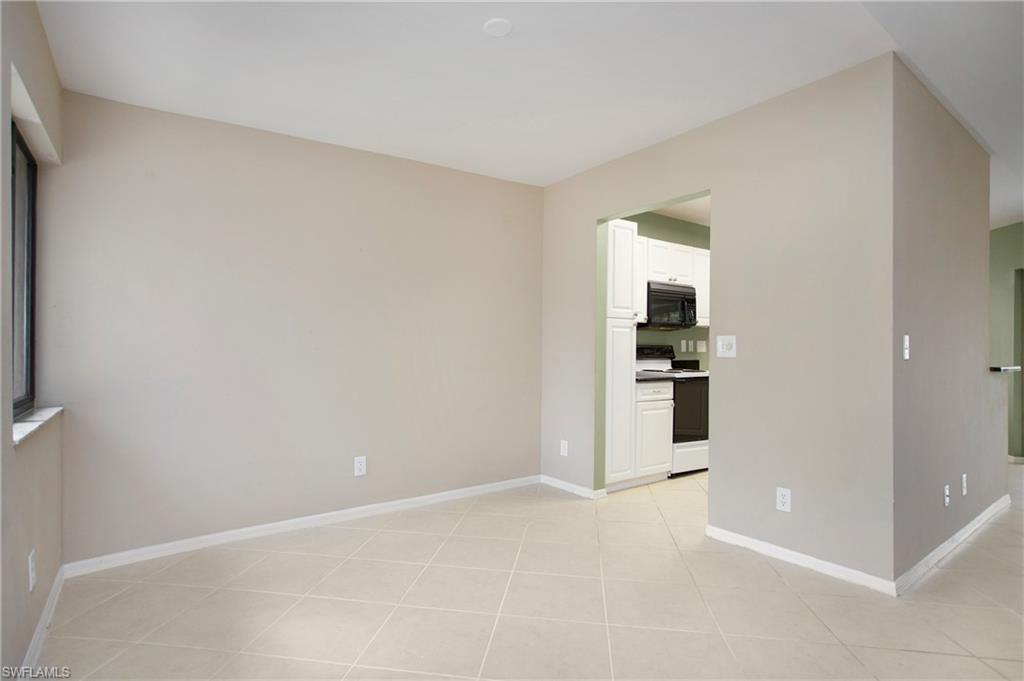 191 Bennington Drive, Unit 124 Naples, FL 34104 - Photo 7 of 26 wooden floor in a room