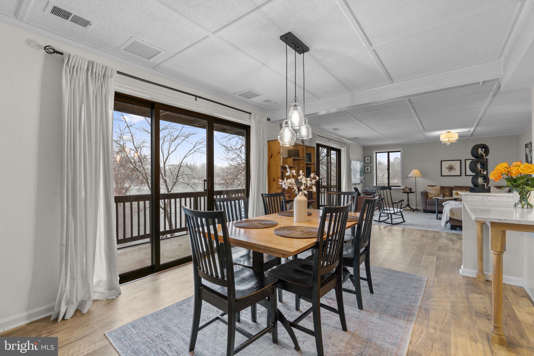 10077 Windstream Drive, Unit 4 Columbia, MD 21044 - Photo 58 of 59 Open floor plan with dining room and living room