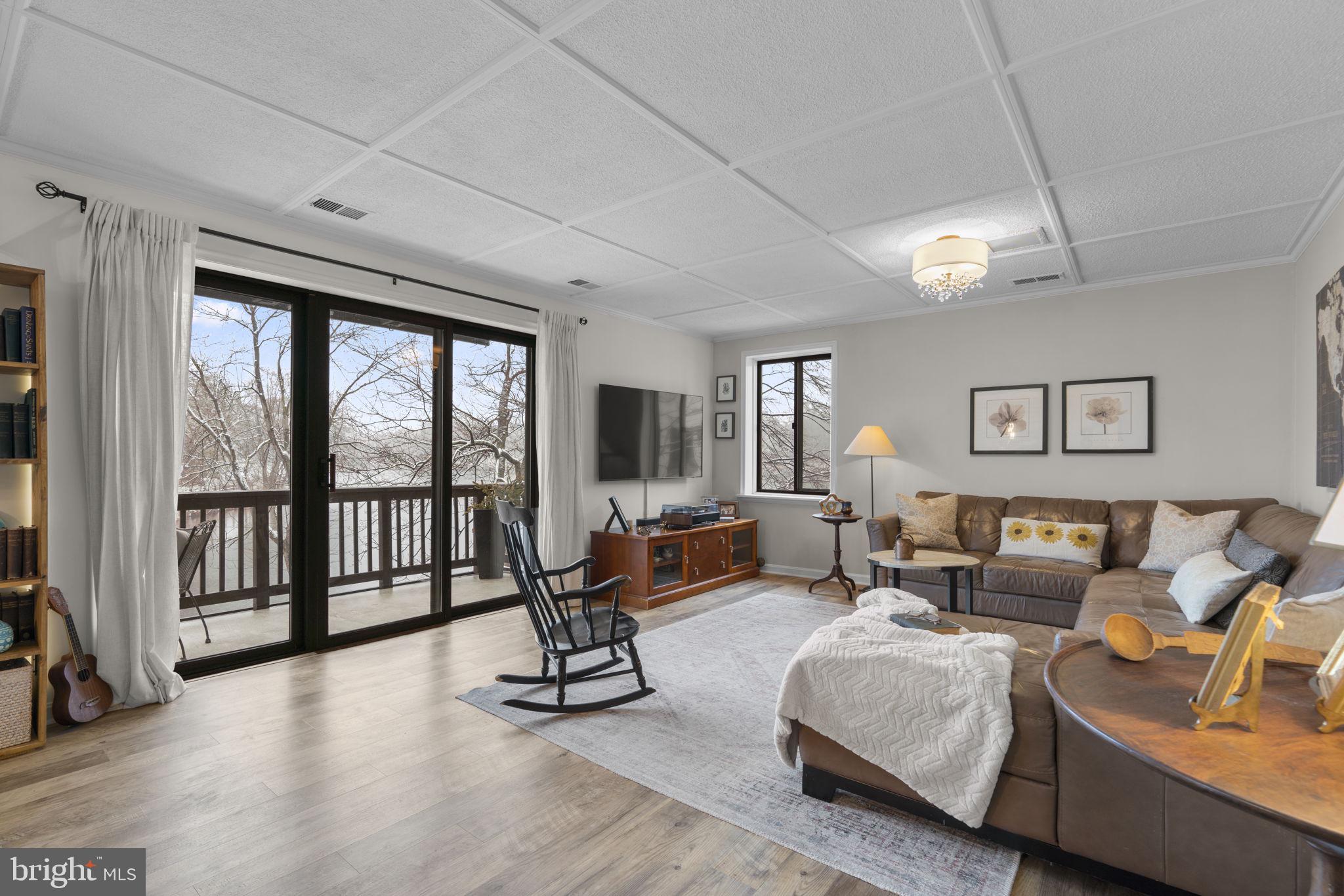 10077 Windstream Drive, Unit 4 Columbia, MD 21044 - Photo 17 of 59 Living room with lake views