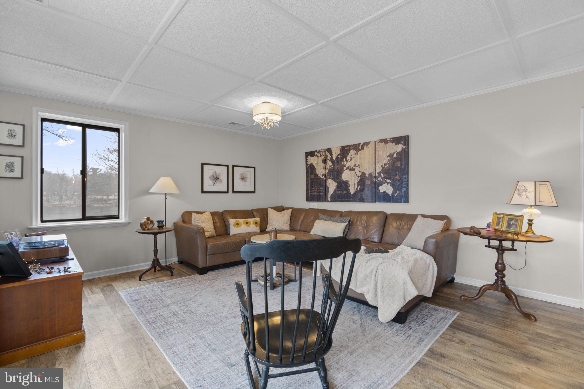 10077 Windstream Drive, Unit 4 Columbia, MD 21044 - Photo 18 of 59 Living room with lake views