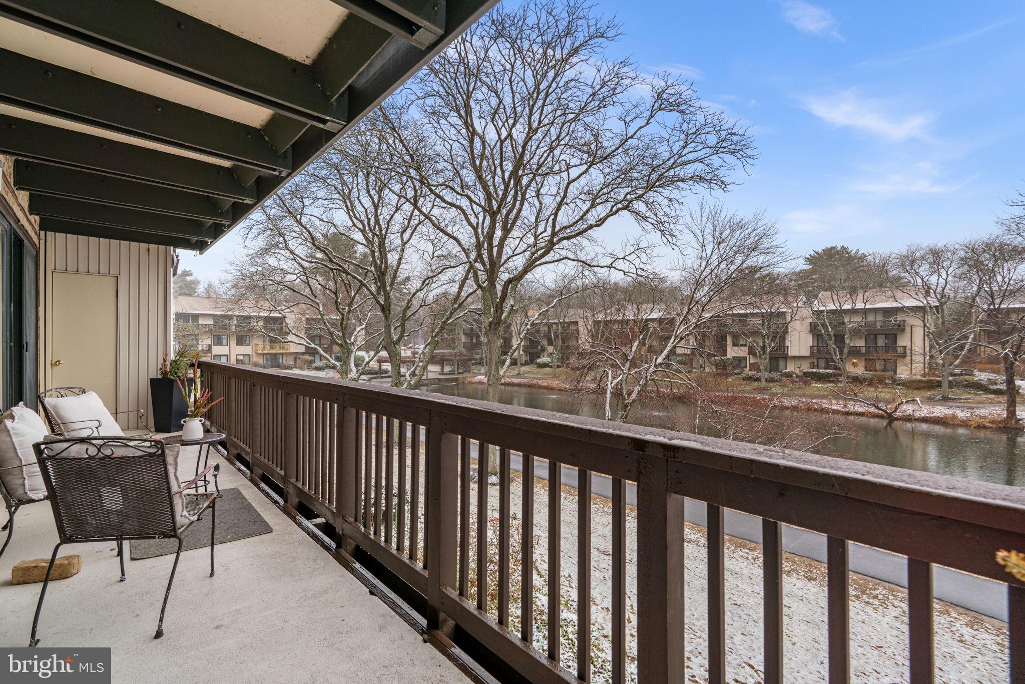 10077 Windstream Drive, Unit 4 Columbia, MD 21044 - Photo 37 of 59 Relax on the balcony with lake views
