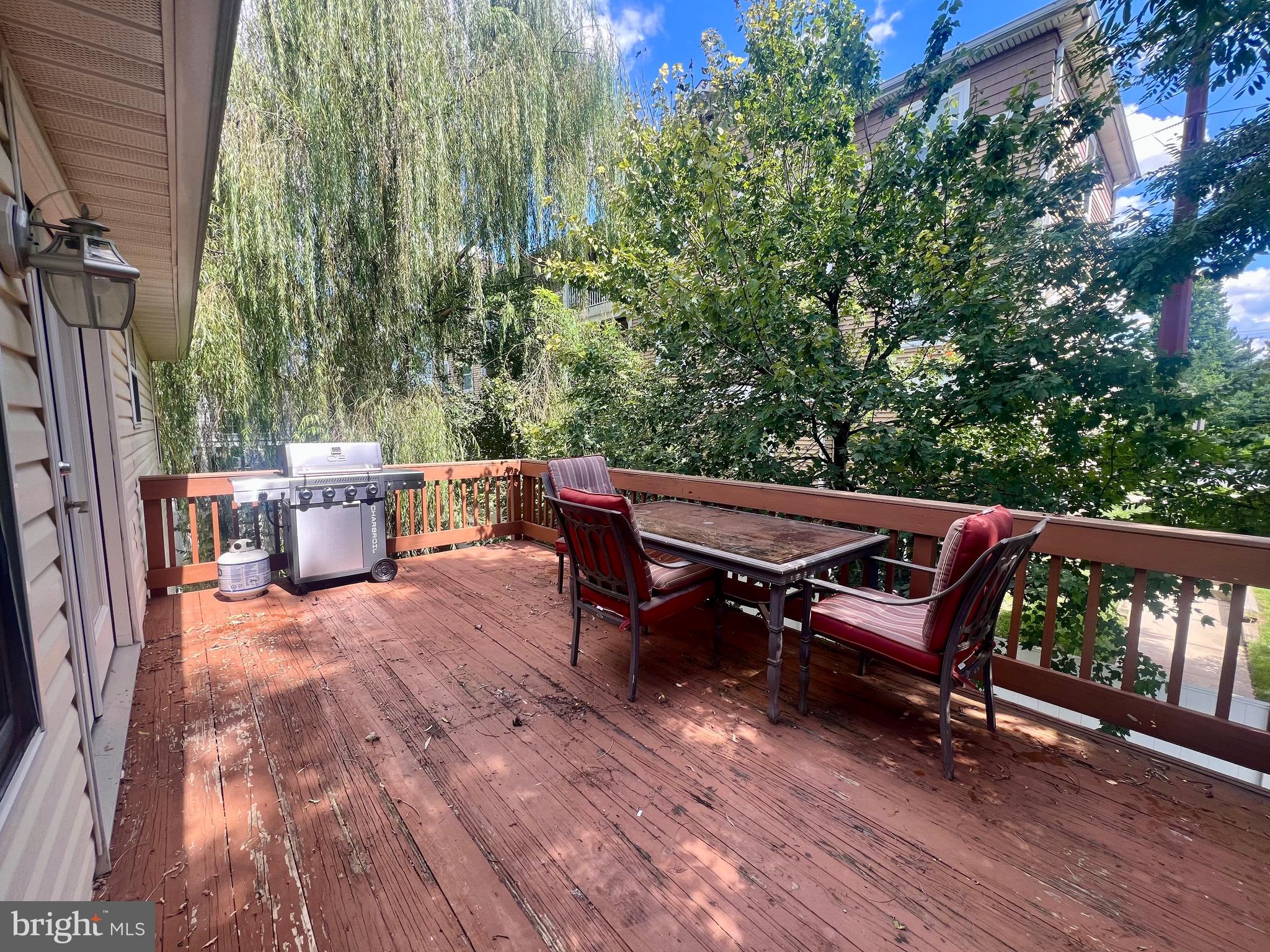103 Henson Road Glen Burnie, MD 21060 - Photo 22 of 29 a view of a patio with a table and chairs