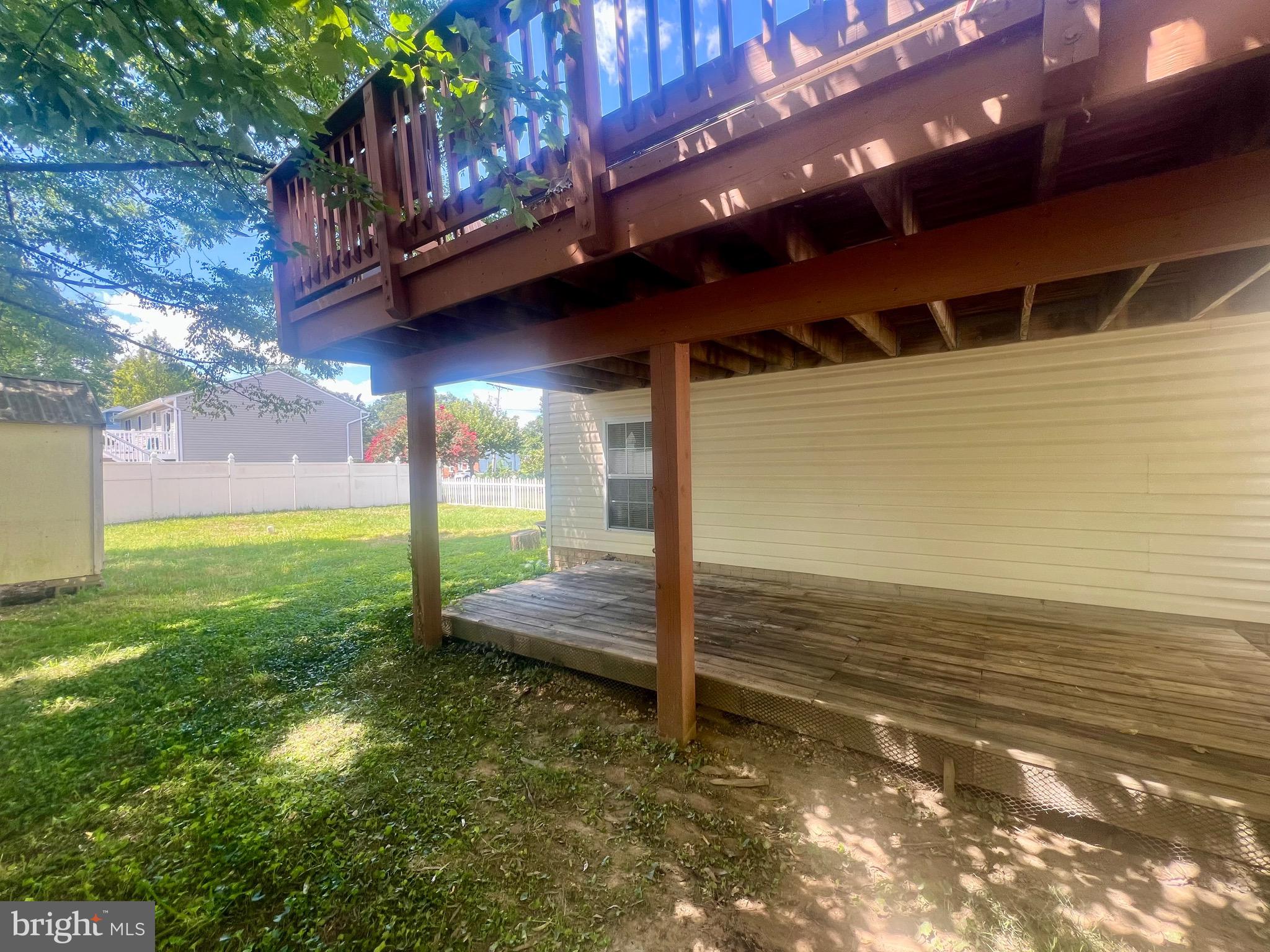 103 Henson Road Glen Burnie, MD 21060 - Photo 25 of 29 a view of a backyard of the house