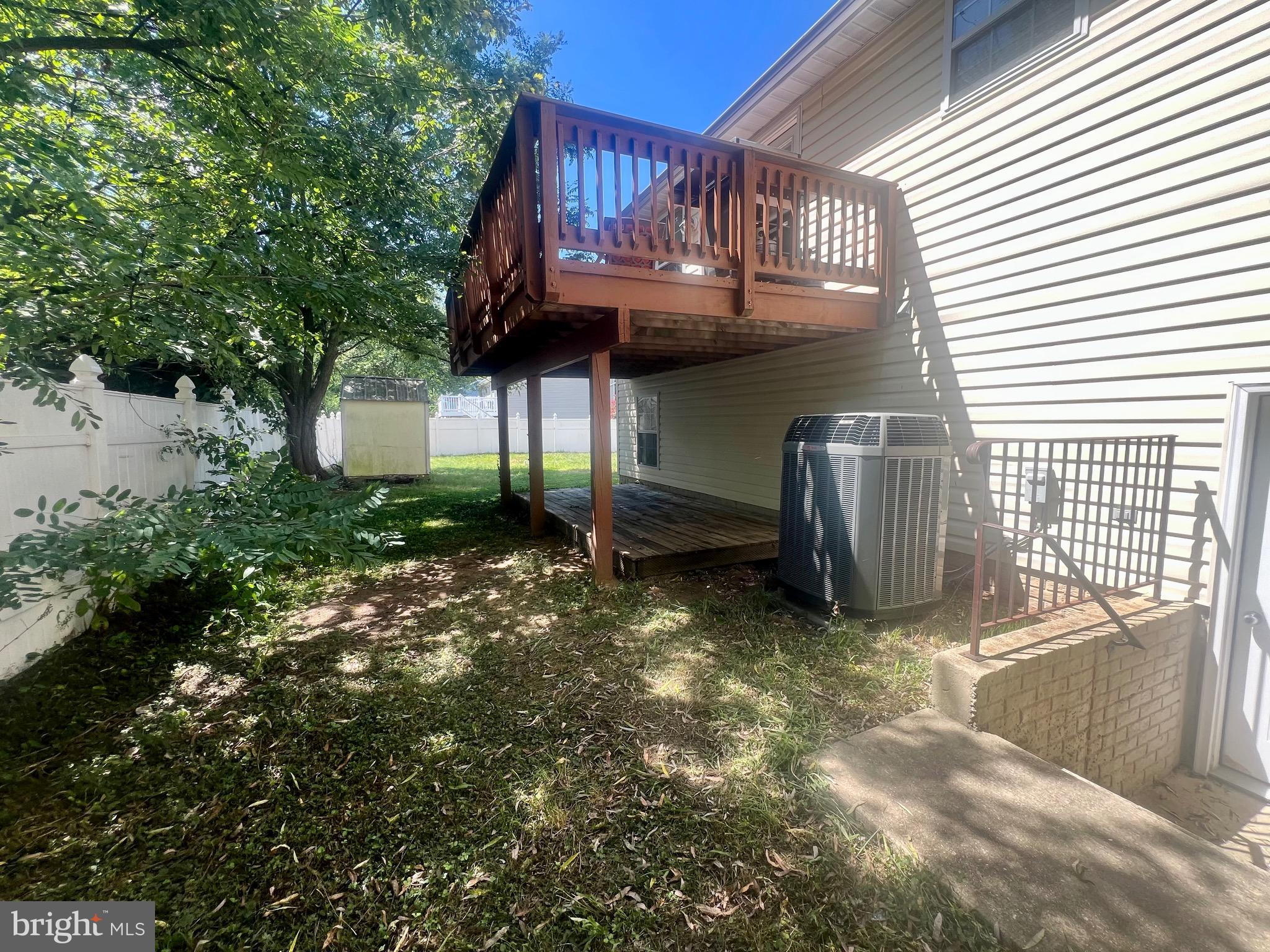 103 Henson Road Glen Burnie, MD 21060 - Photo 27 of 29 a view of a house with a yard