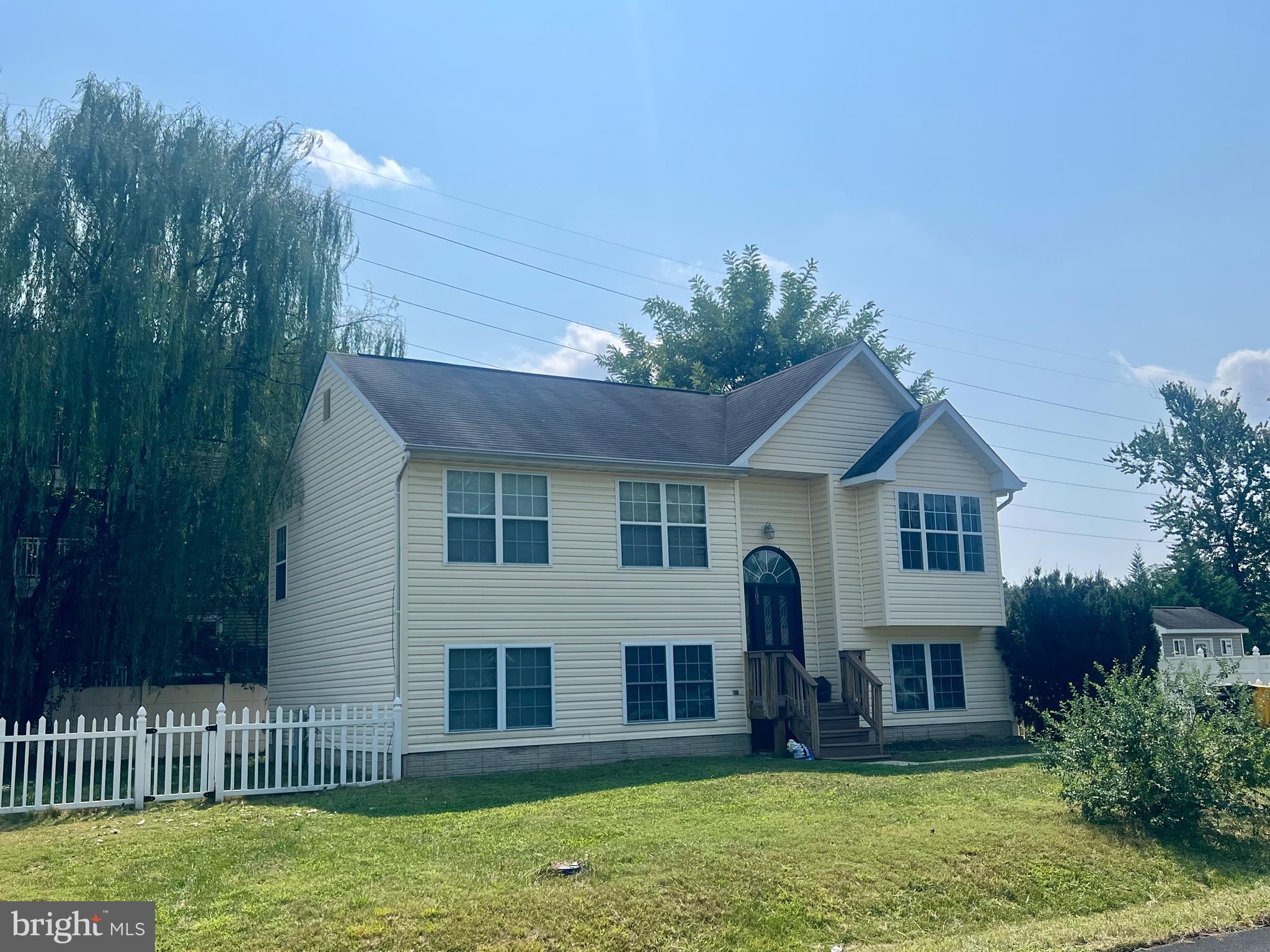 103 Henson Road Glen Burnie, MD 21060 - Photo 4 of 29 a front view of house with yard and green space