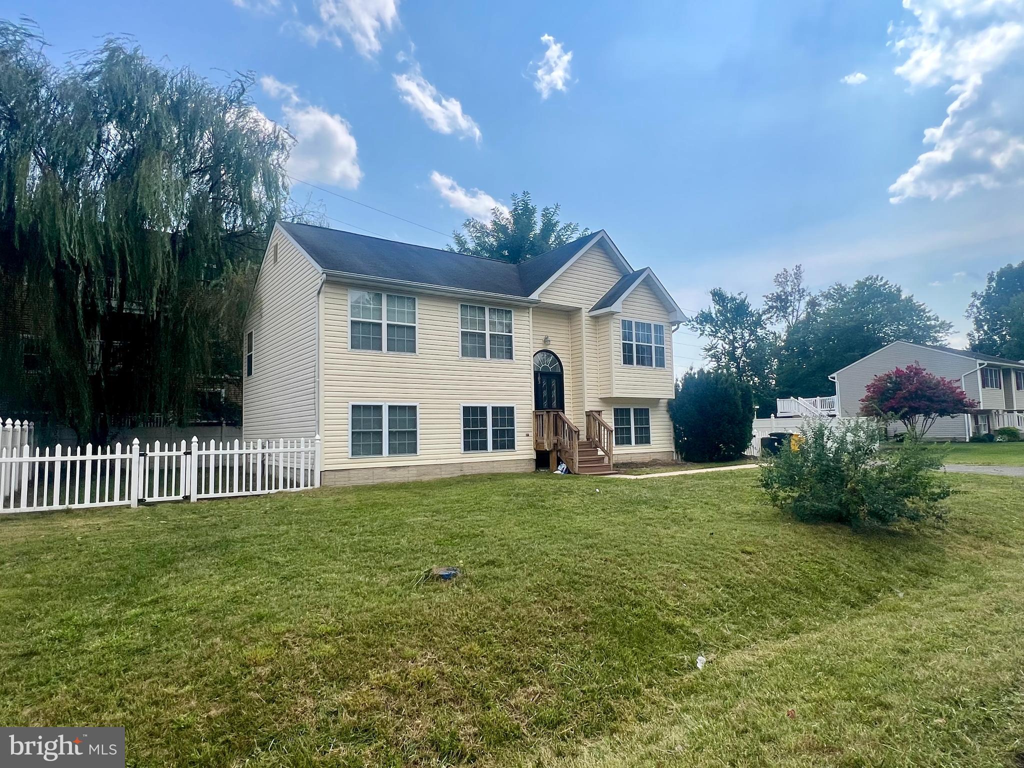 103 Henson Road Glen Burnie, MD 21060 - Photo 5 of 29 a front view of house with yard and green space