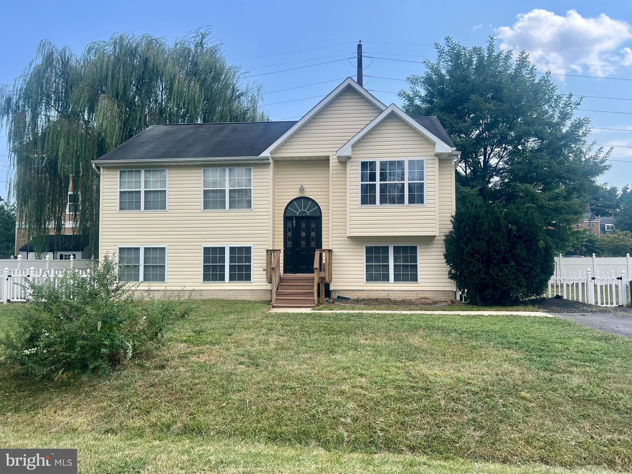 103 Henson Road Glen Burnie, MD 21060 - Photo 8 of 29 a front view of a house with a yard