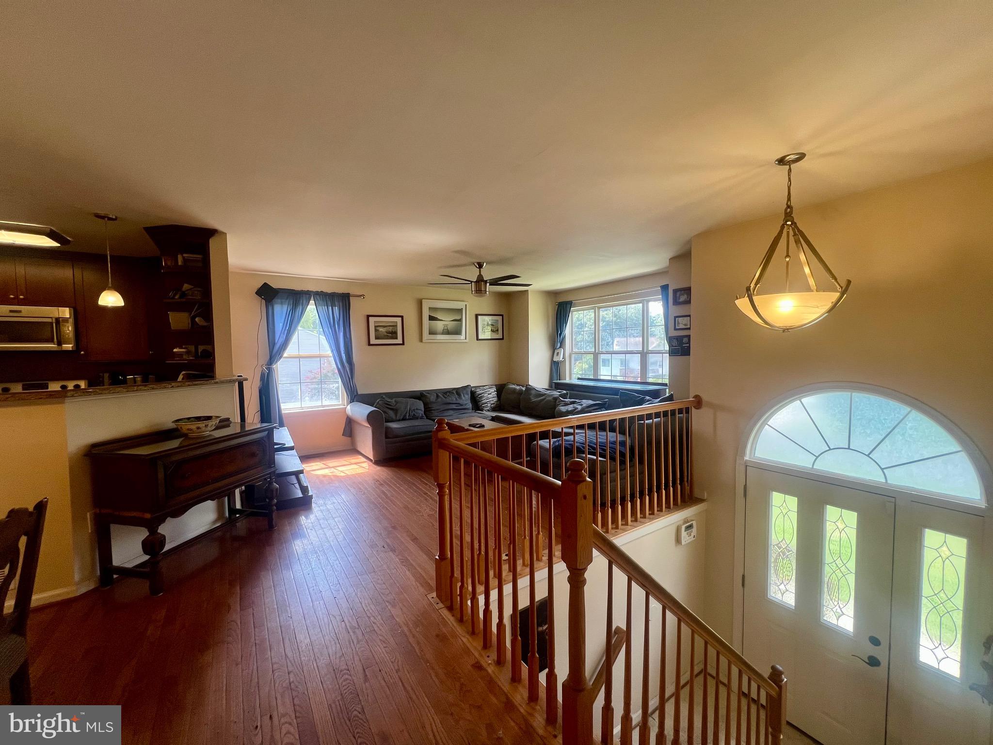 103 Henson Road Glen Burnie, MD 21060 - Photo 9 of 29 a living room with furniture and a wooden floor