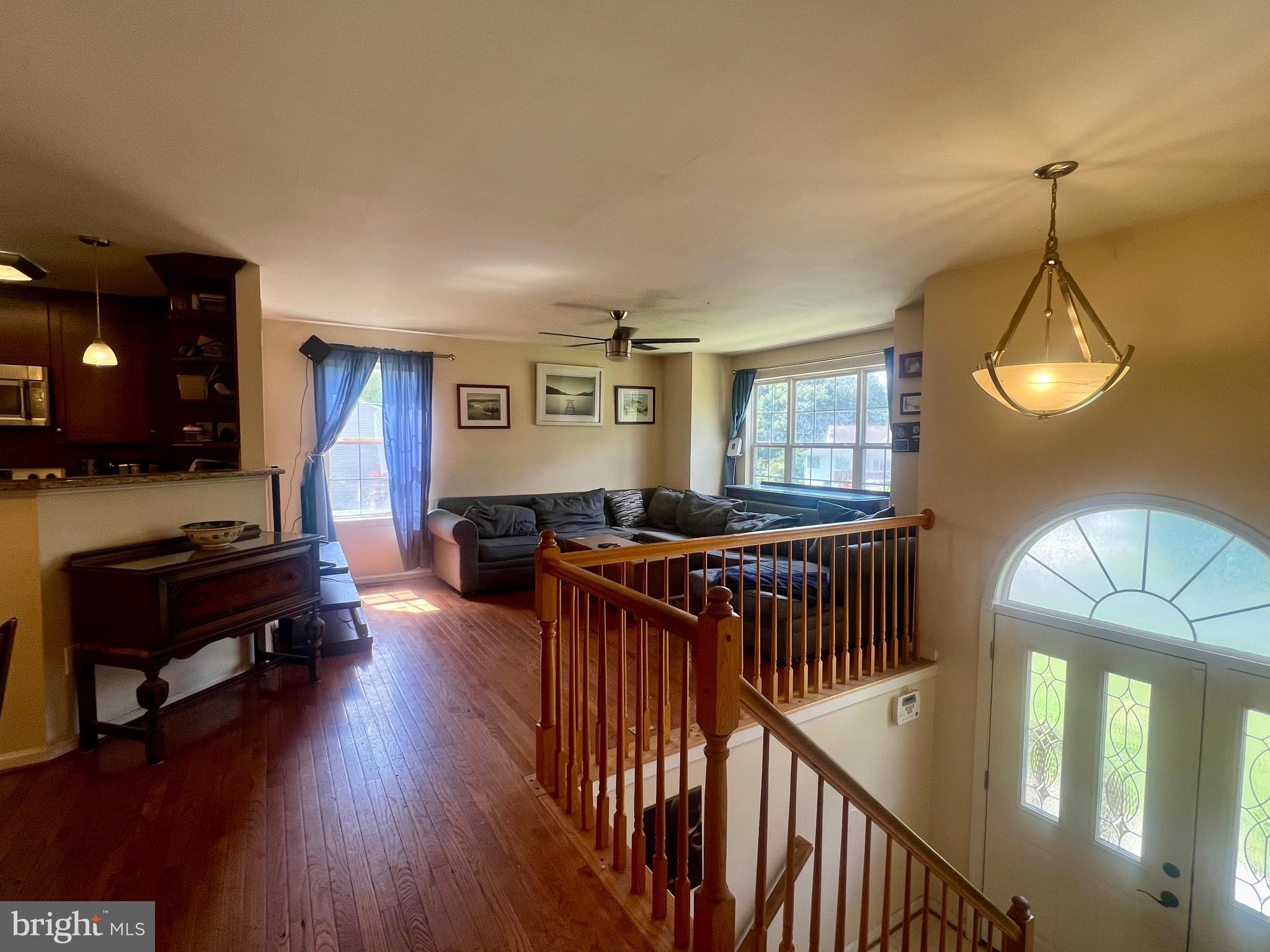 103 Henson Road Glen Burnie, MD 21060 - Photo 10 of 29 a living room with furniture and a wooden floor