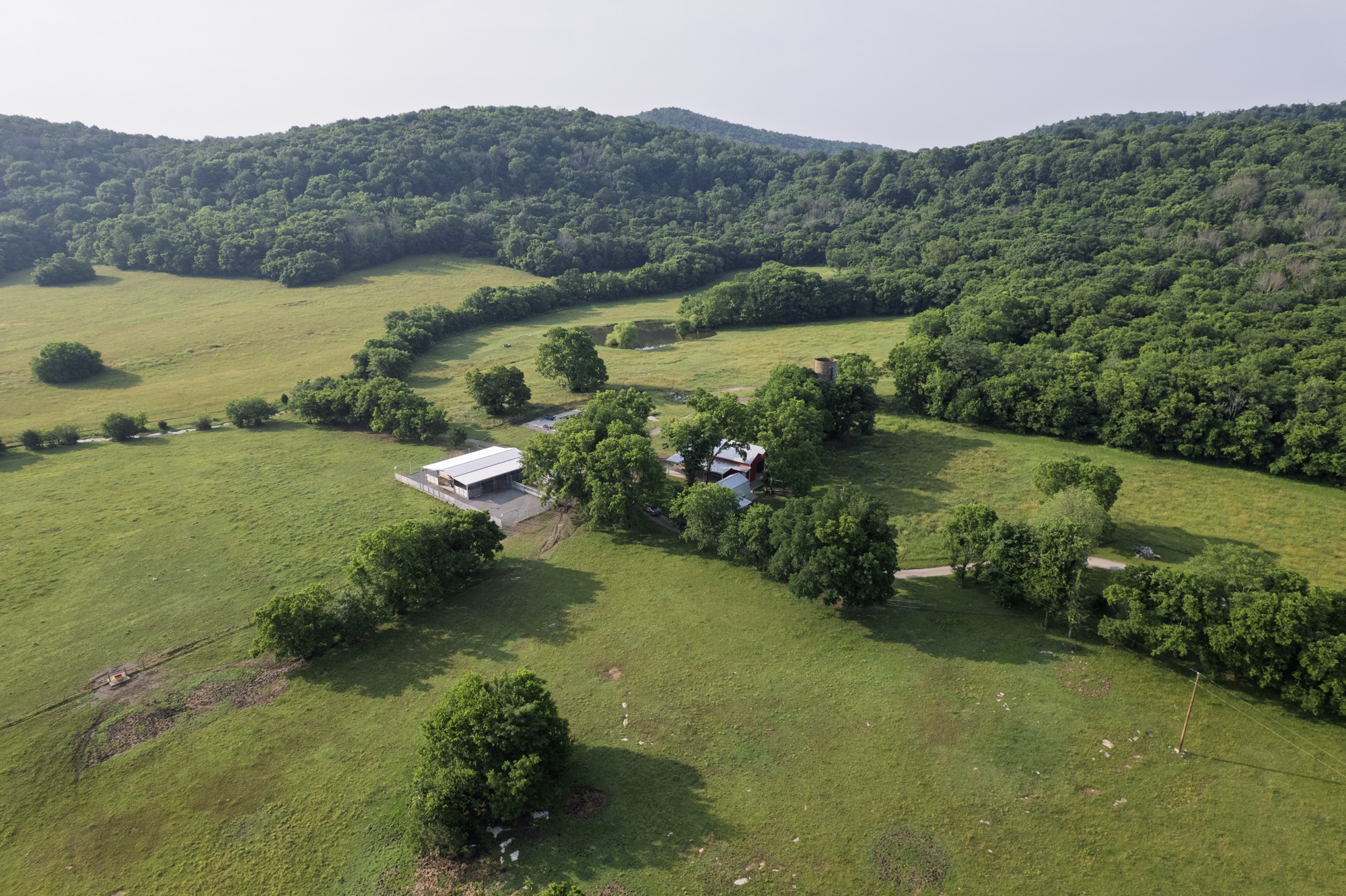 6180 Southeast Tater Peeler Road Lebanon, TN 37090 - Photo 24 of 41 a view of a lush green hillside and houses