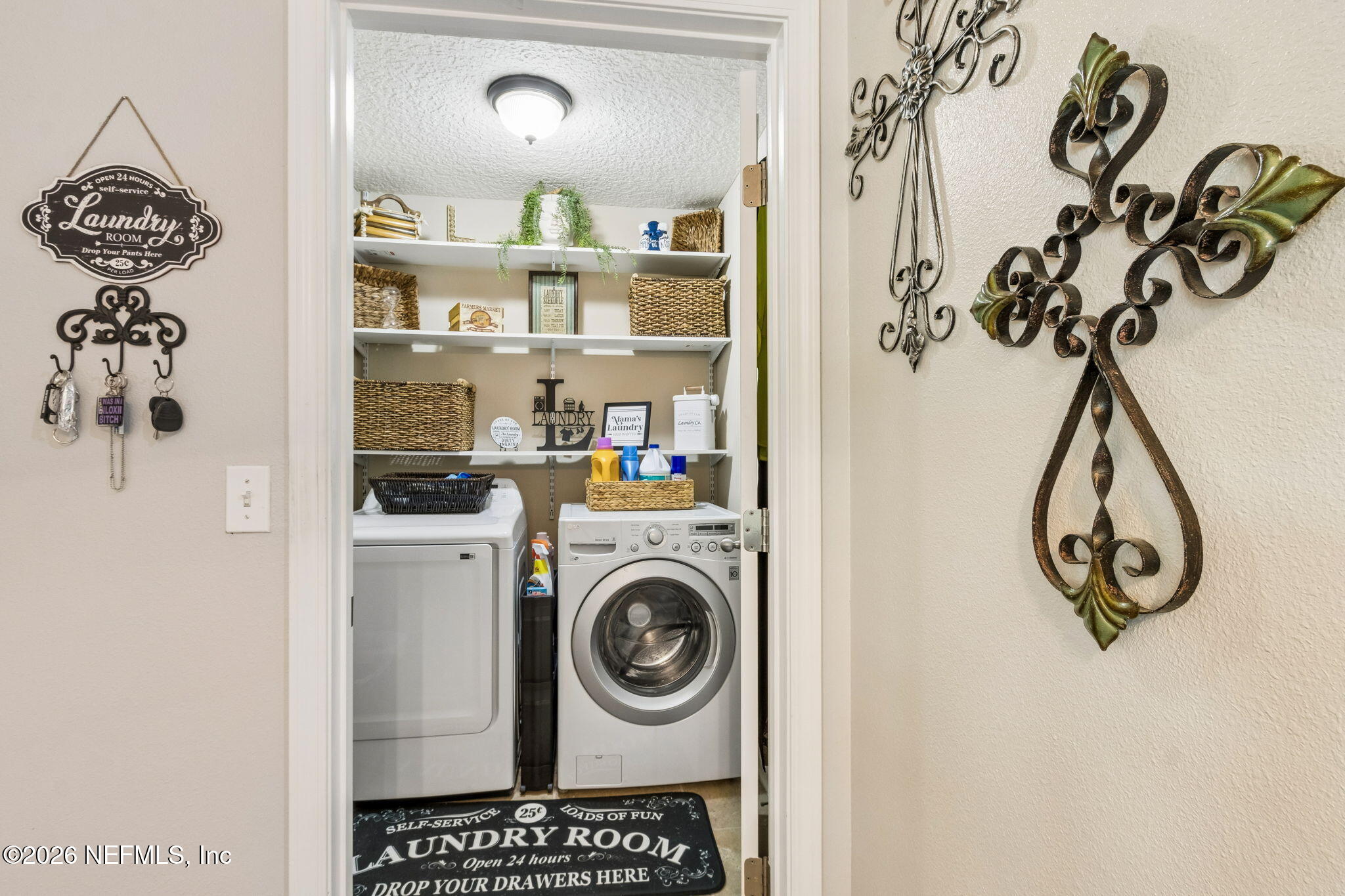 96034 Bass Lane Yulee, FL 32097 - Photo 24 of 50 a view of a storage & utility room with a washer and dryer