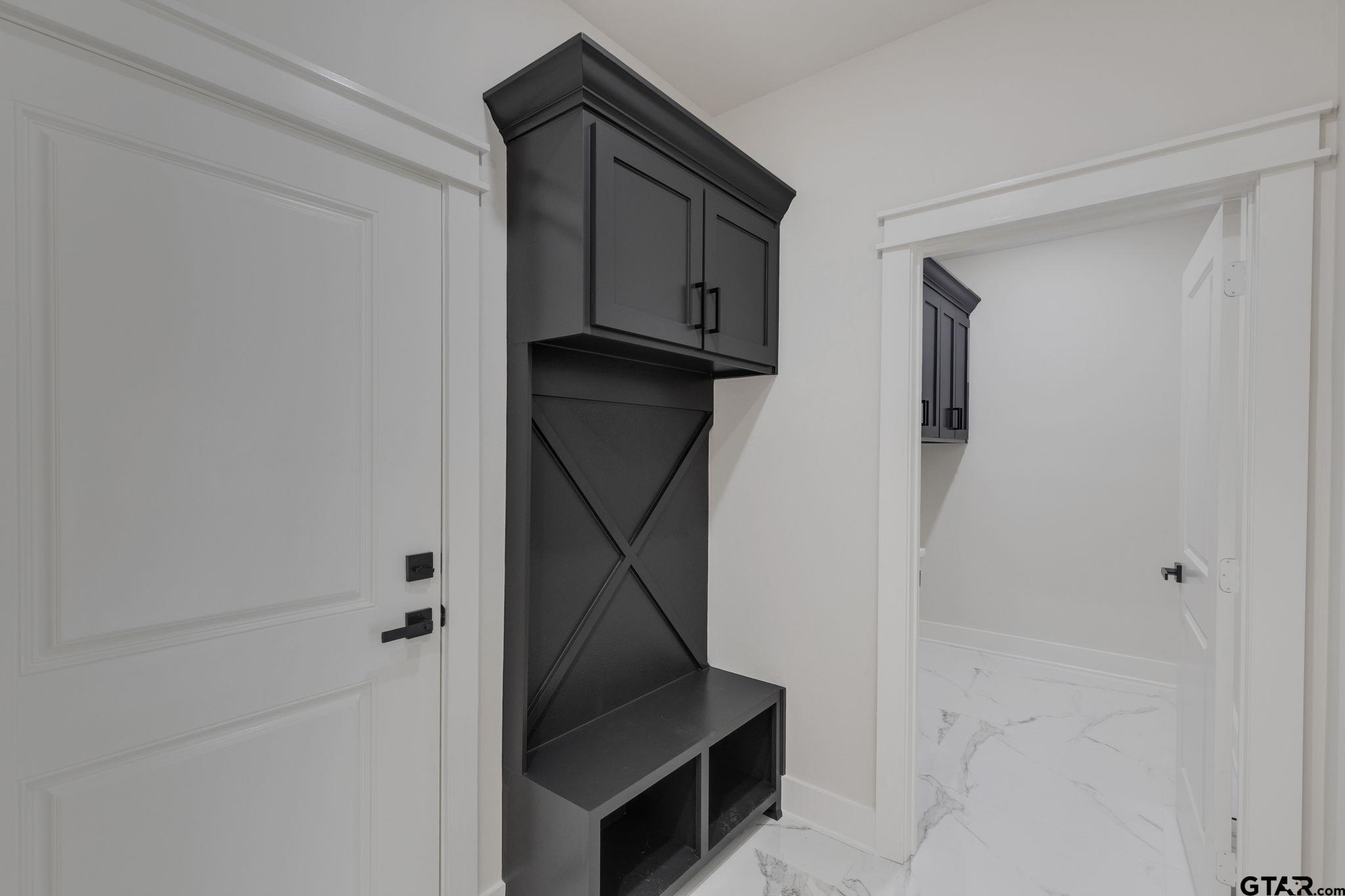 11089 Tammi Trail Tyler, TX 75709 - Photo 16 of 30 a view of an entryway with wooden floor