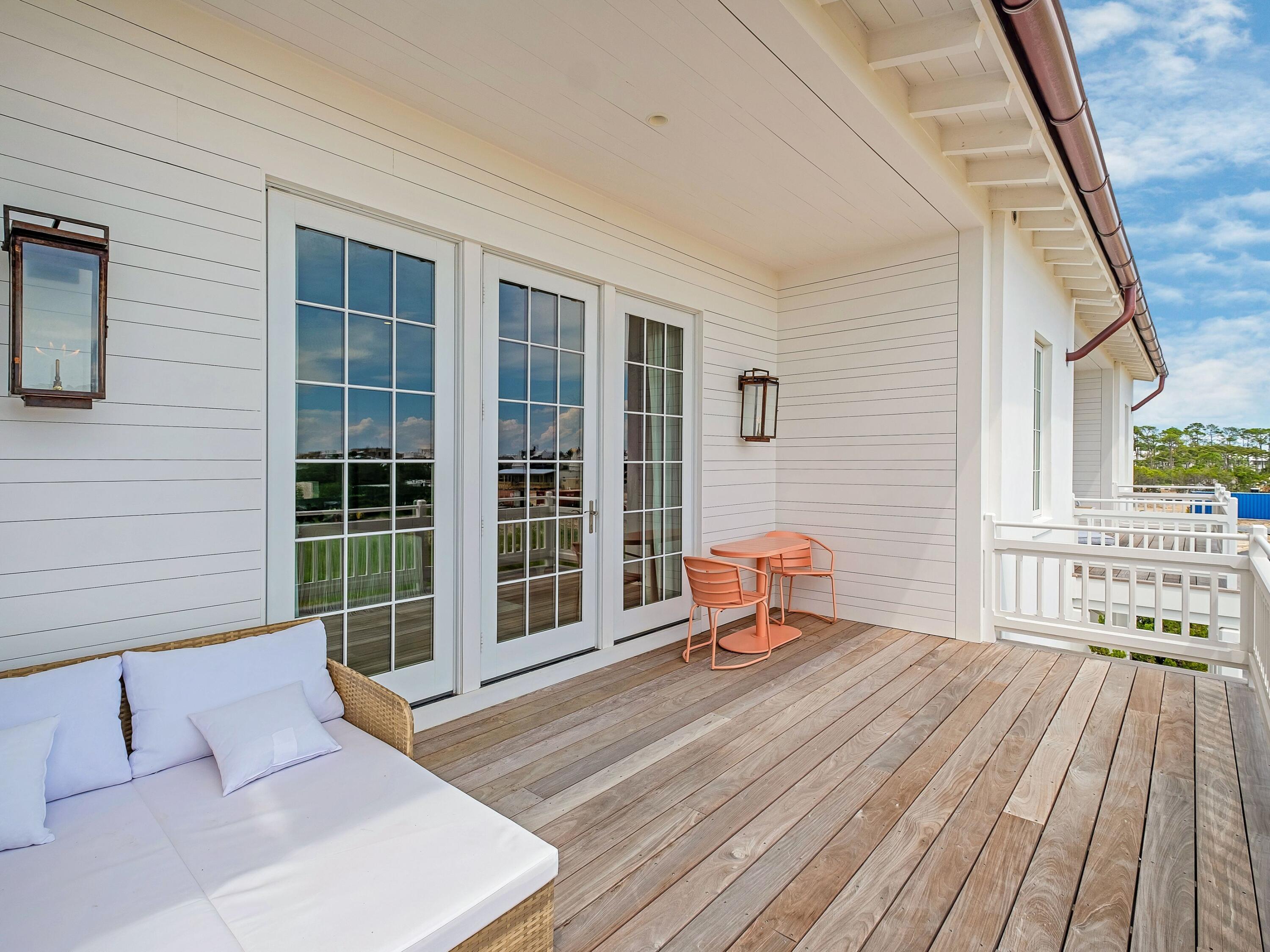 19 Astra Way Inlet Beach, Unit M14 Inlet Beach, FL 32461 - Photo 21 of 30 a balcony view with a seating space