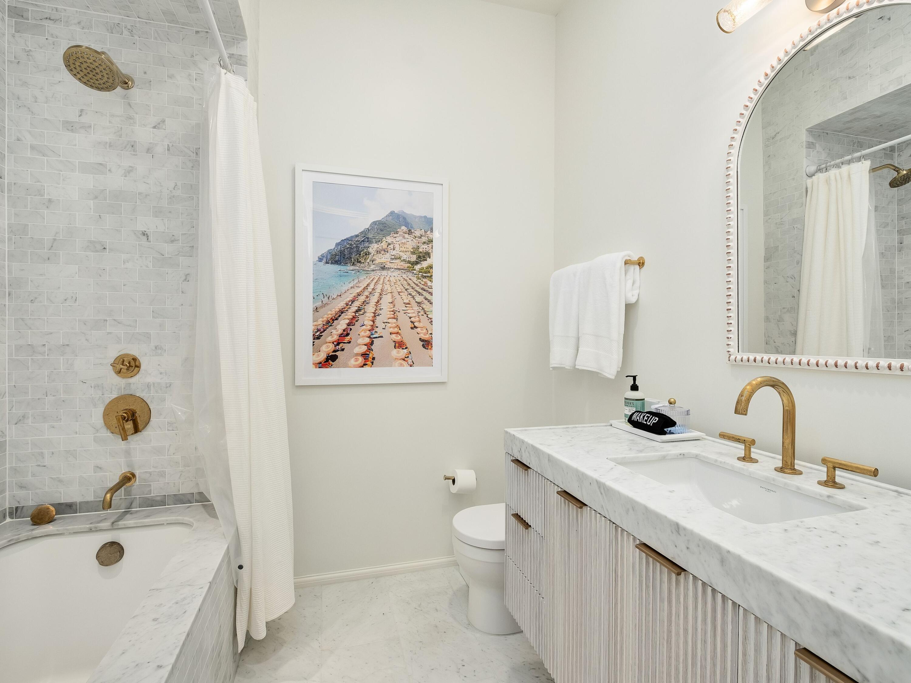 19 Astra Way Inlet Beach, Unit M14 Inlet Beach, FL 32461 - Photo 23 of 30 a bathroom with a double vanity sink mirror and bathtub