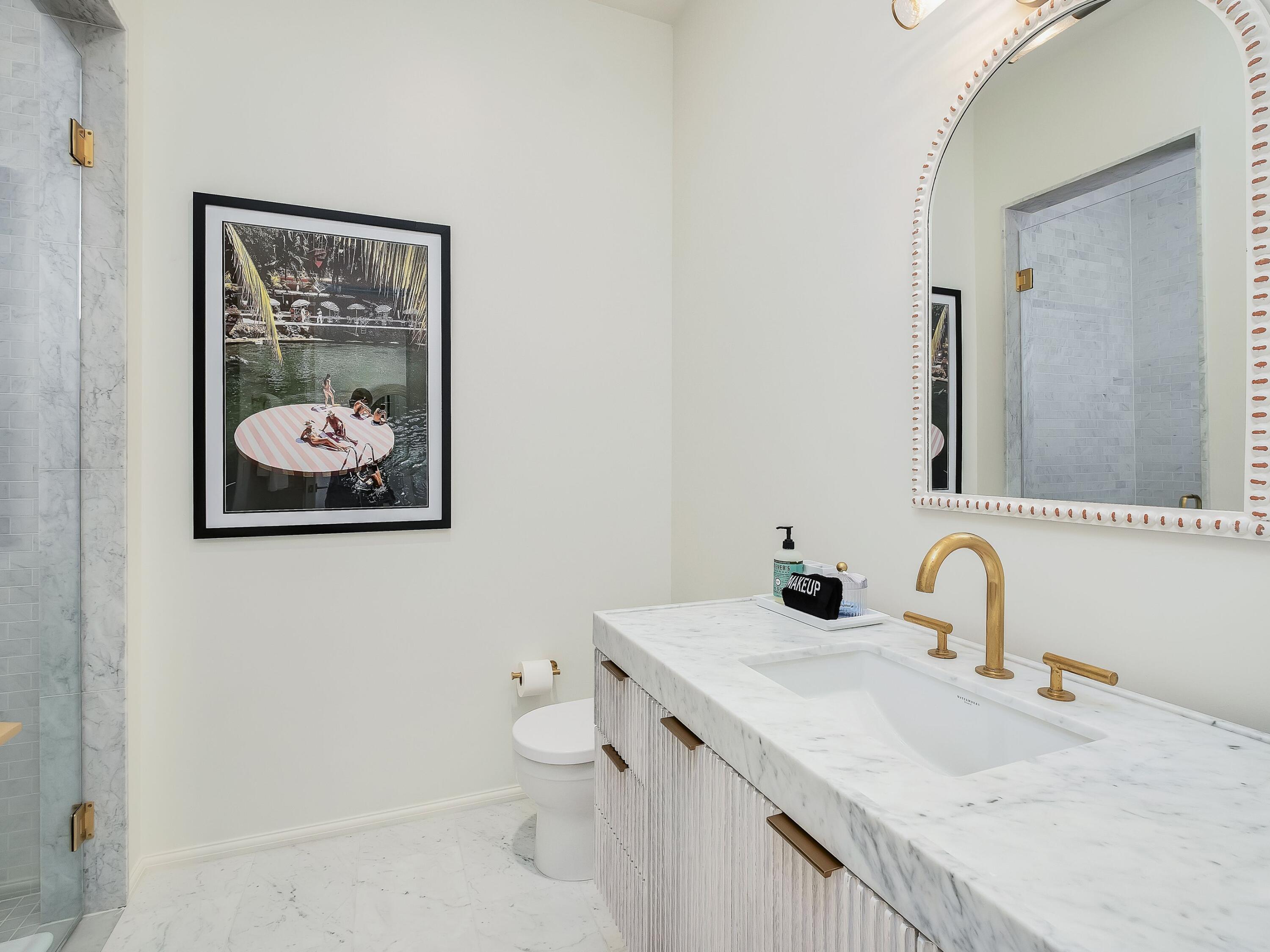 19 Astra Way Inlet Beach, Unit M14 Inlet Beach, FL 32461 - Photo 24 of 30 a bathroom with a granite countertop sink mirror and toilet