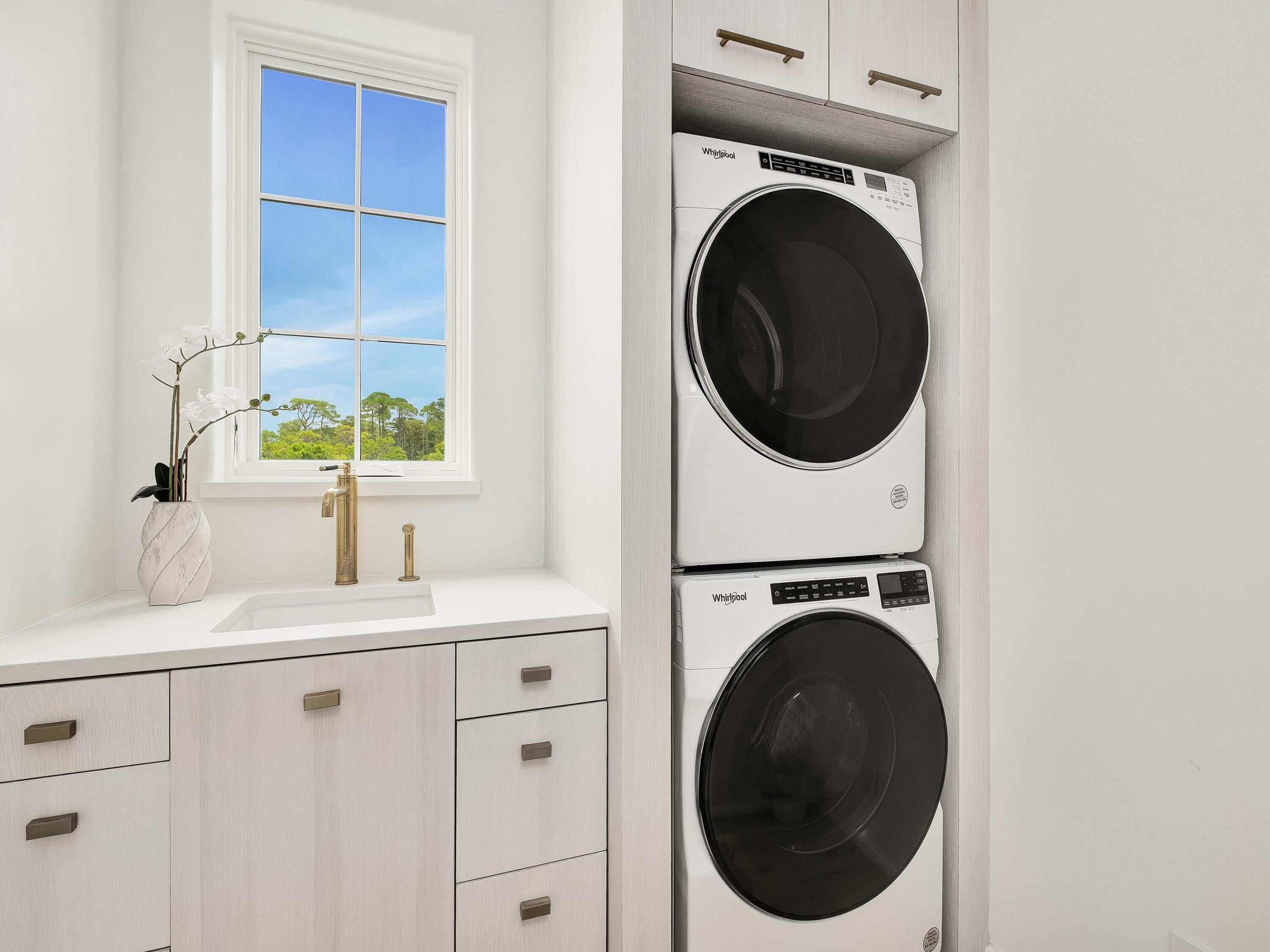 19 Astra Way Inlet Beach, Unit M14 Inlet Beach, FL 32461 - Photo 27 of 30 a utility room with sink dryer and washer