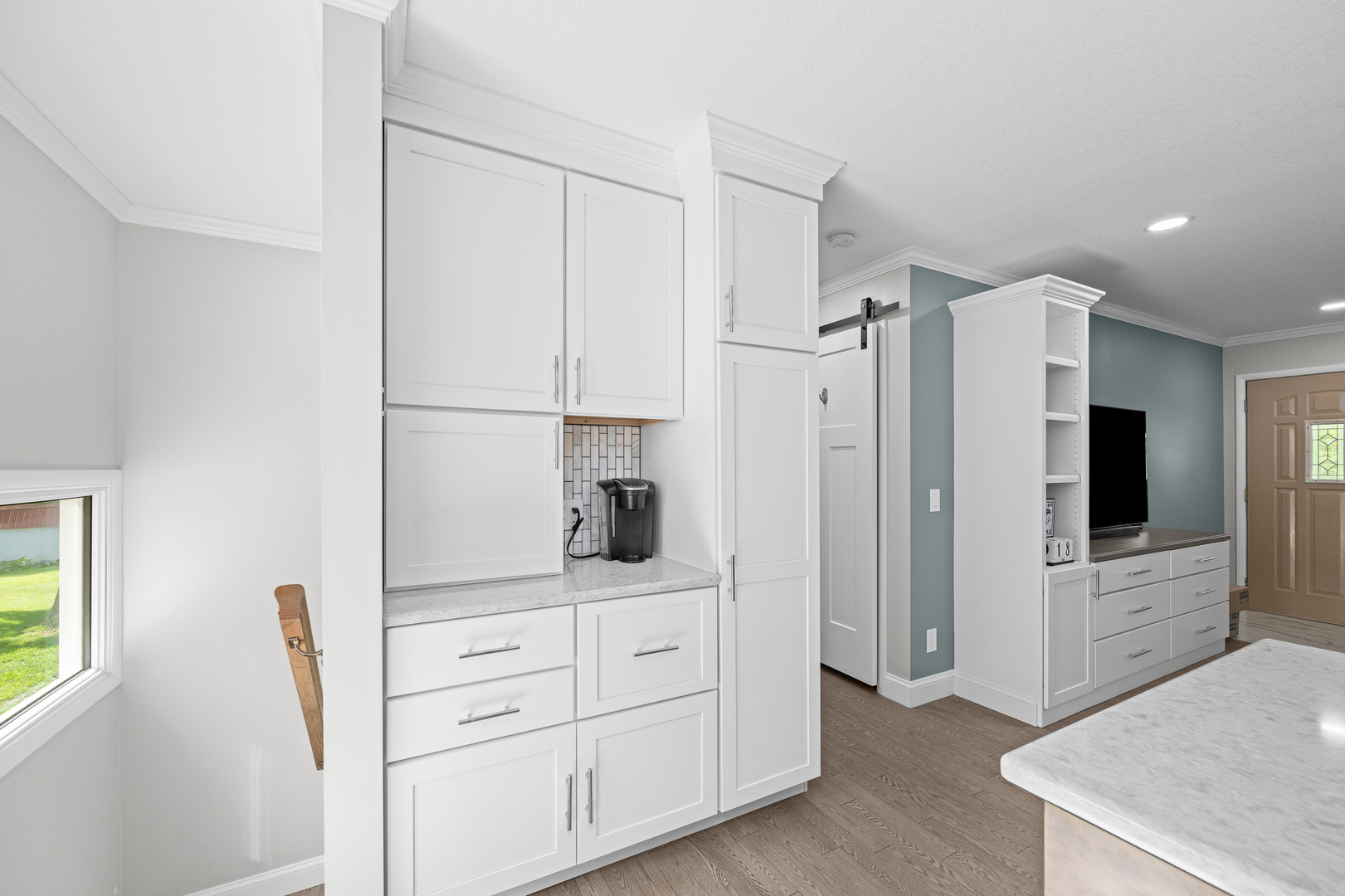 506 Bush Street Reynolds, IL 61279 - Photo 15 of 37 a kitchen with white cabinets and refrigerator