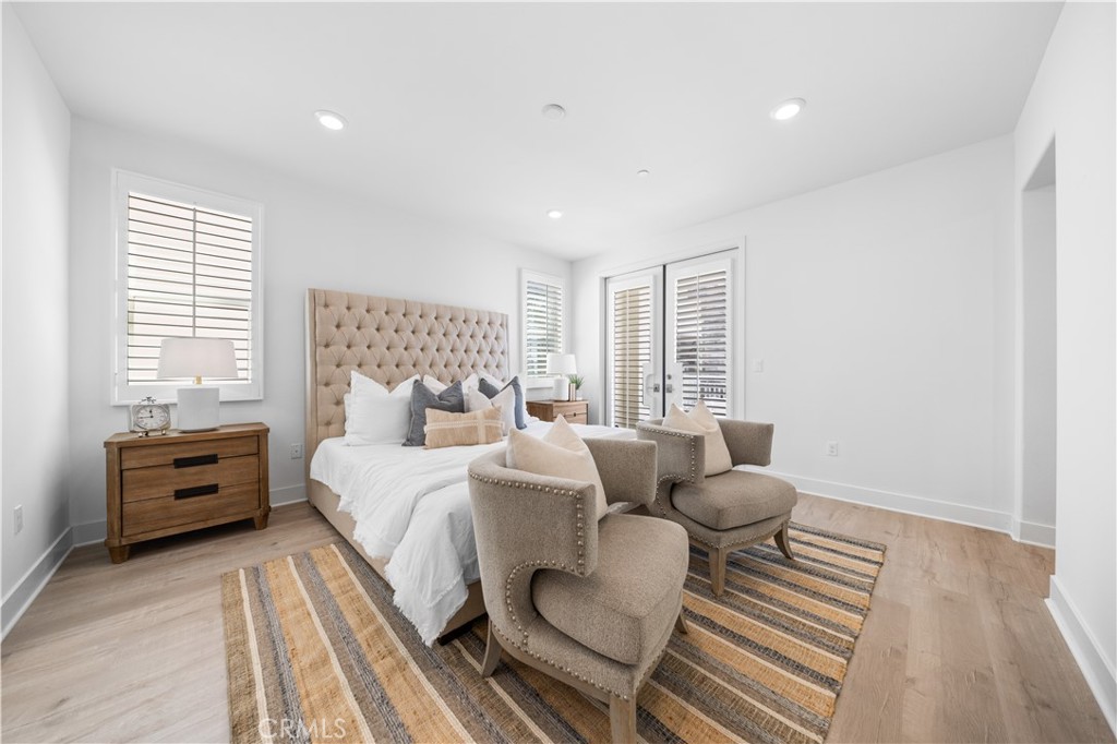 108 Catalyst Irvine, CA 92618 - Photo 29 of 60 a bed room with bed and windows