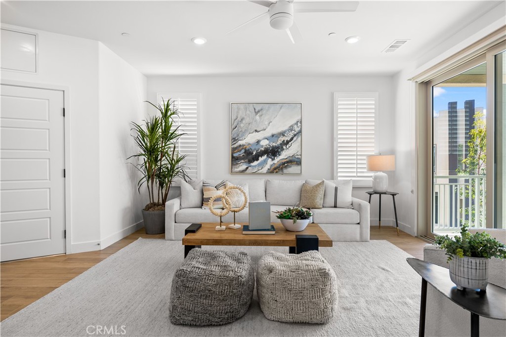108 Catalyst Irvine, CA 92618 - Photo 47 of 60 a living room with furniture and a large window