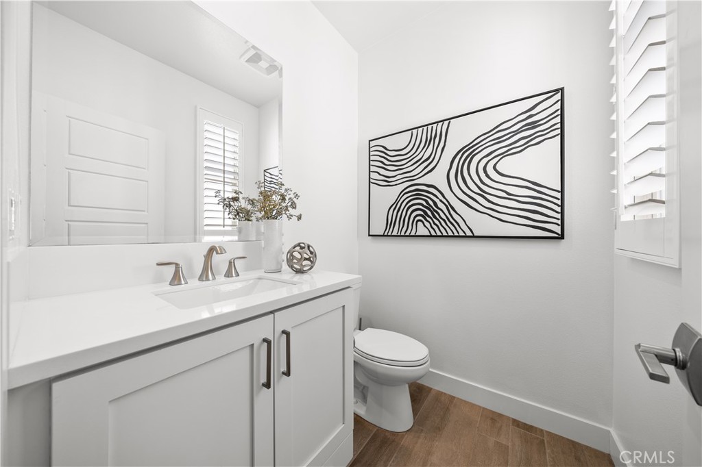 108 Catalyst Irvine, CA 92618 - Photo 48 of 60 a bathroom with a sink and a toilet