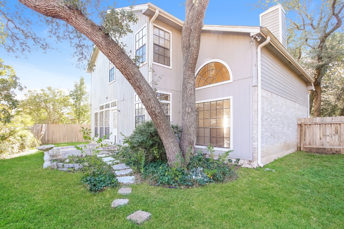 2802 Hummingbird Circle Cedar Park, TX 78613 - Photo 15 of 15 a front view of a house with garden