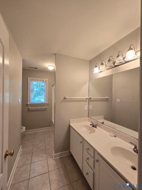 16406 Benmore Road Moseley, VA 23120 - Photo 21 of 32 a bathroom with a sink and mirror