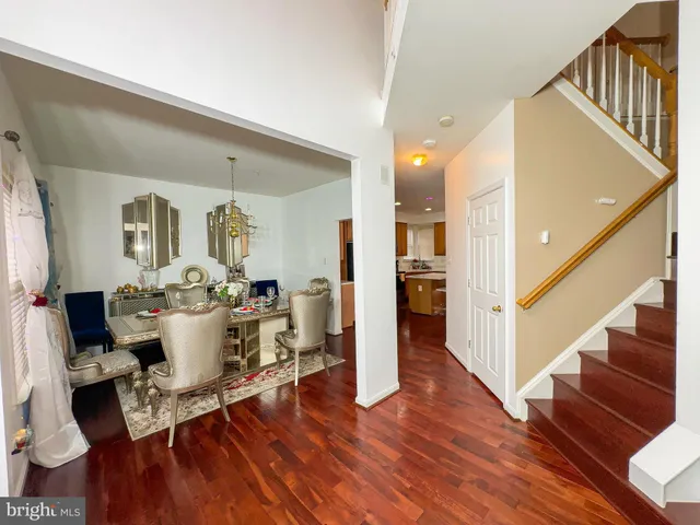 a view of a living room and dining room