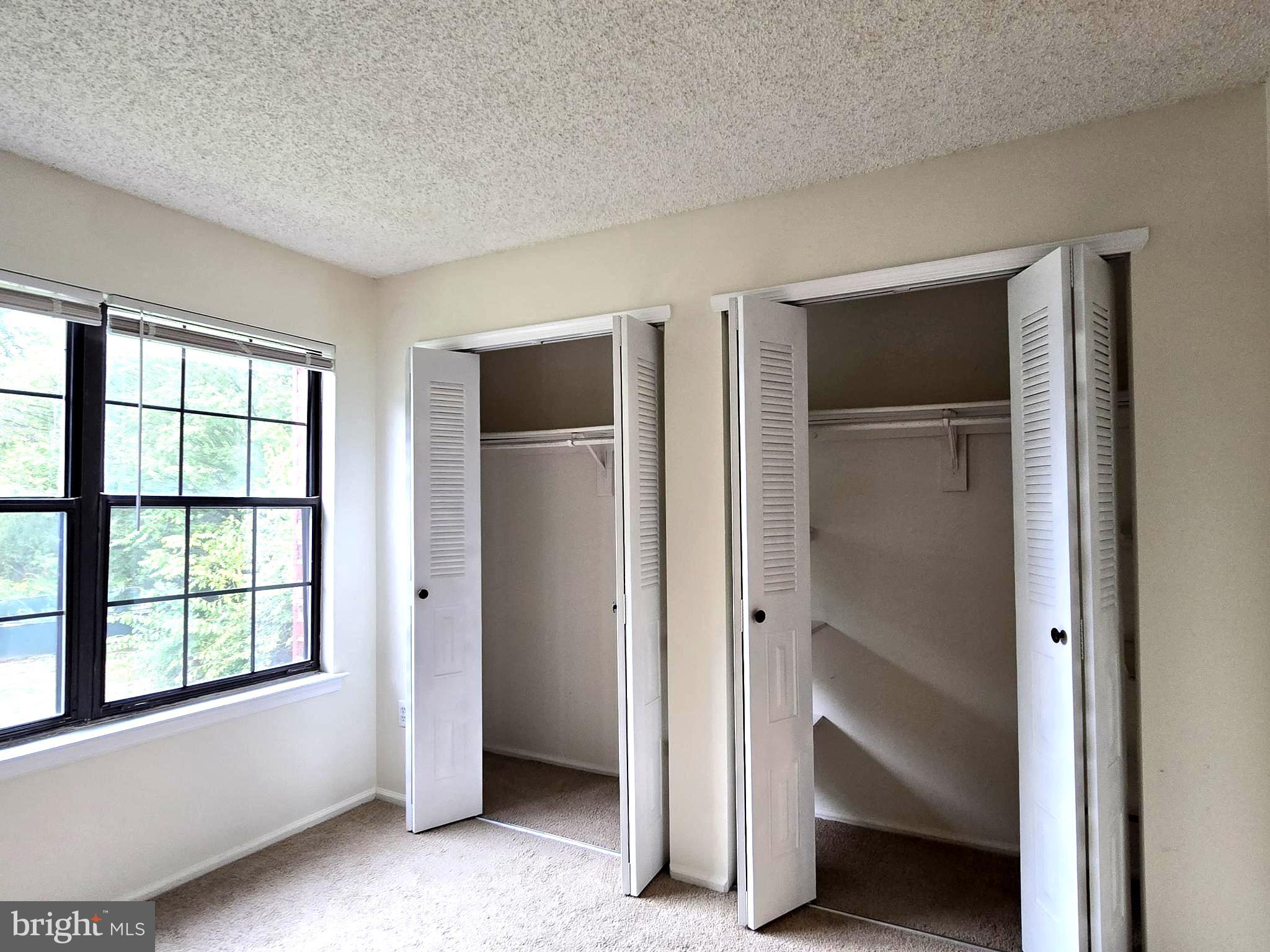 13 Voscek Court Lawrence Township, NJ 08648 - Photo 12 of 13 a view of an empty room and window