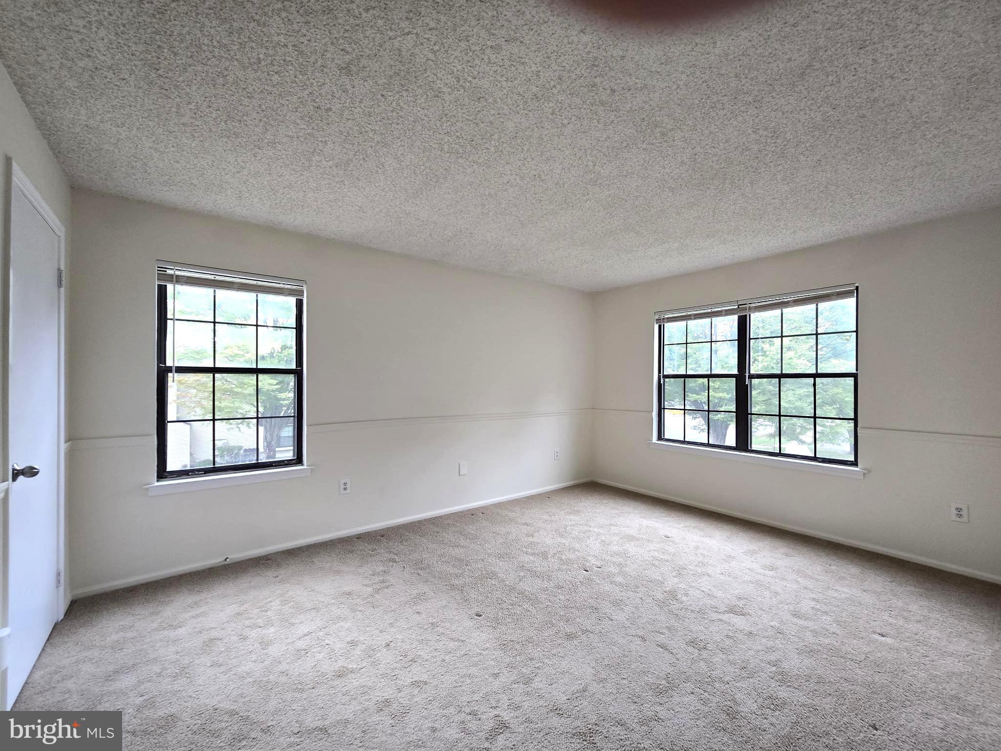 13 Voscek Court Lawrence Township, NJ 08648 - Photo 9 of 13 an empty room with a window