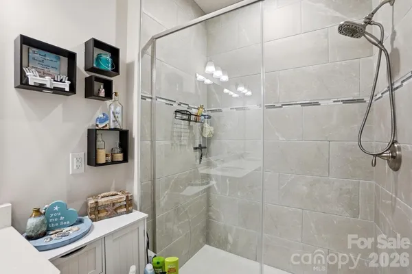 a bathroom with a sink and mirror