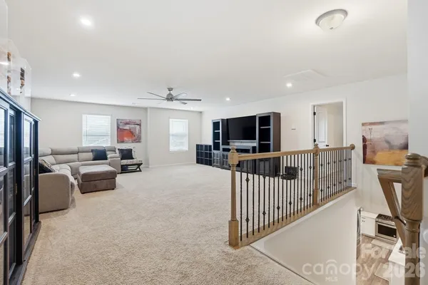 a view of a hallway view with staircase
