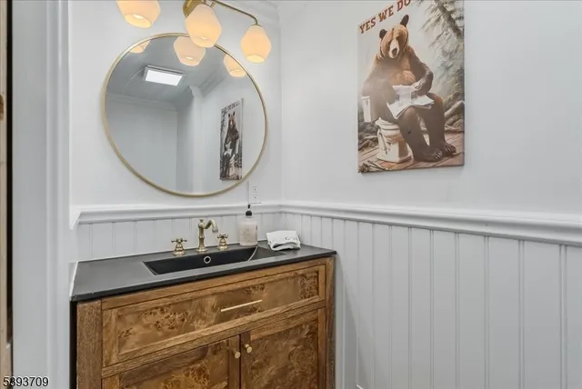 a living room with furniture fireplace and a large window