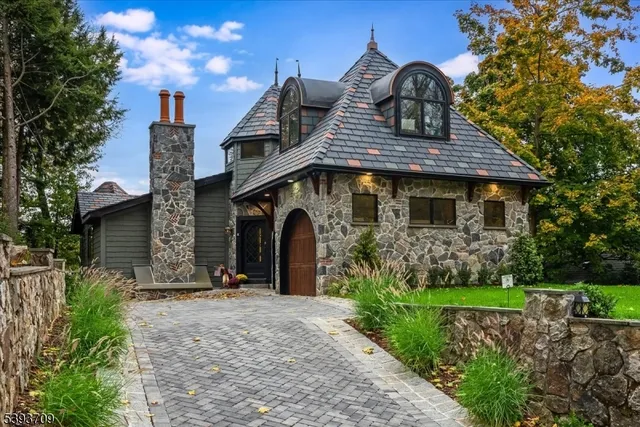 a kitchen with white cabinets and appliances